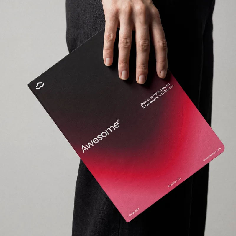 Awesome notebook cover held in one hand